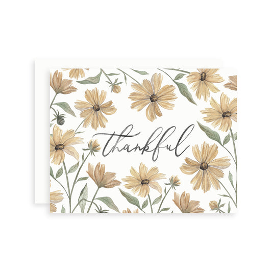 Greeting card with yellow coreopsis wildflowers and the word 'thankful' on a white background