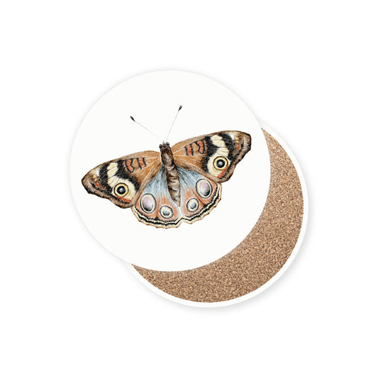 Set of 4 round stone ceramic coasters featuring a watercolor butterfly illustration on a white background