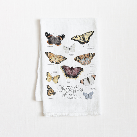 Tea towel with illustrations of butterflies on a white background