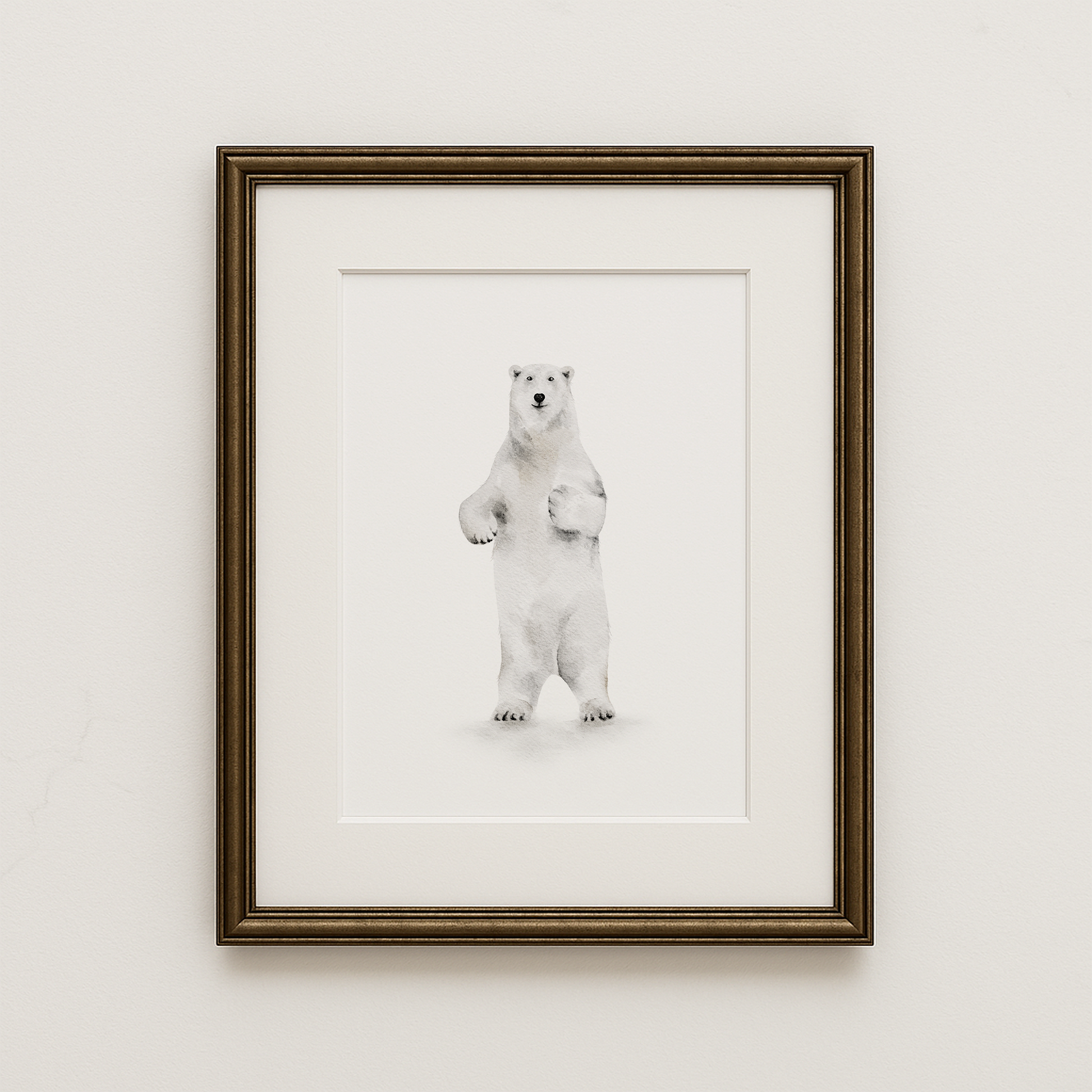 Framed artwork of a polar bear on a white wall