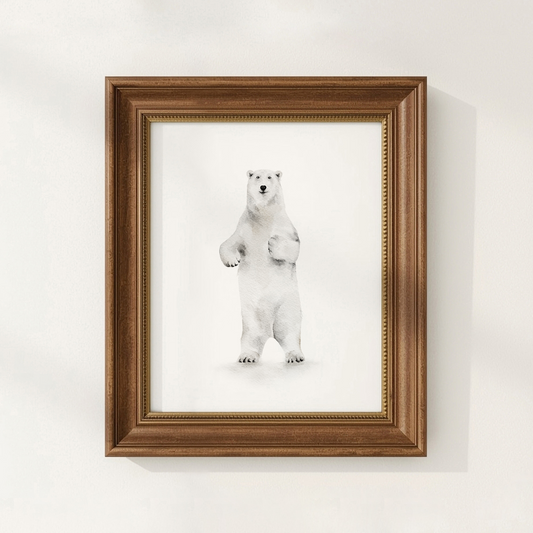 Framed picture of a polar bear on a white wall