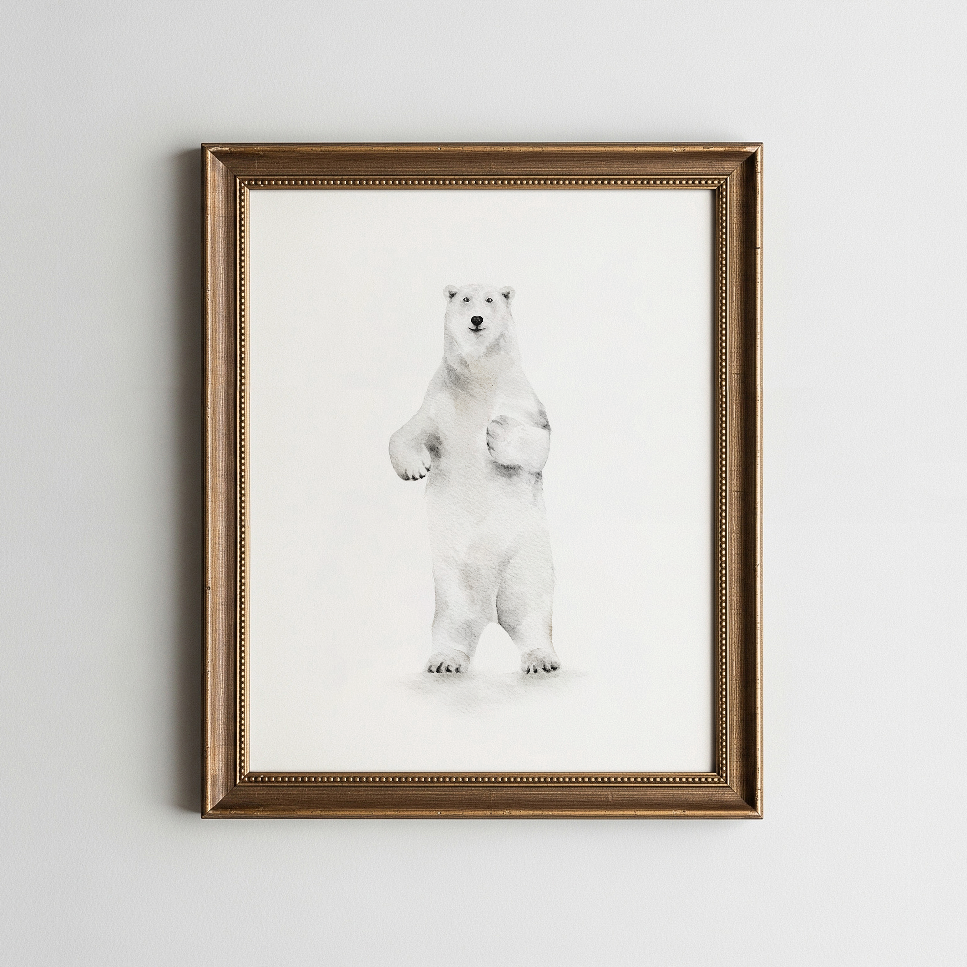 Framed artwork of a polar bear on a light gray background